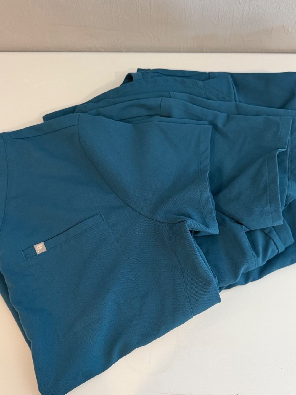 Fabletics Women's Vital 1-Pocket Scrub Tops Set of Three in Teal Caribbean Blue